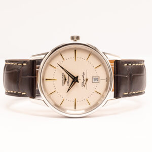 Longines Flagship Heritage L4.795.4.78.2, 38 mm automaattikello klassisella vaalealla kellotaululla. Alkuperäiset paperit ja kotelo sisältyvät.
